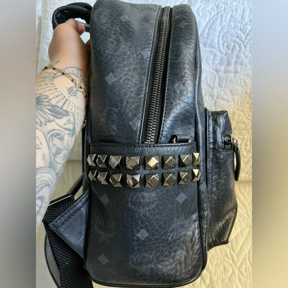 Stark Side Studs Backpack In Visetos, black side pockets w/stud details leather